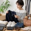 カインドオル宅配買取でブランド古着を査定するイメージ